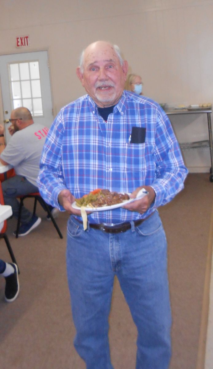 Man with plate of food